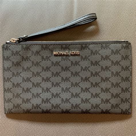 michael kors jet set logo coated canvas pouch